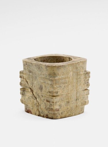 Two-tier tube (<em>cong</em> 琮) with masks
