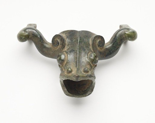 Ornament in the form of a ram head