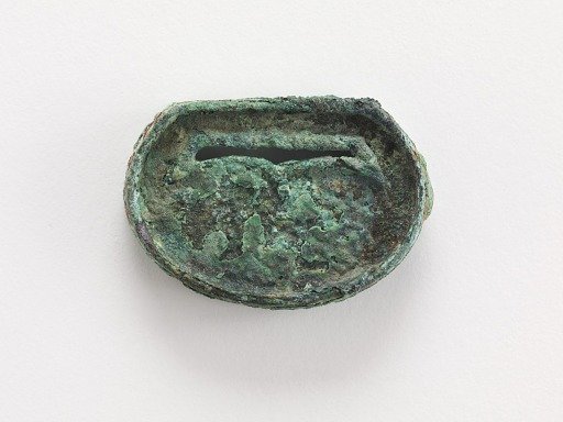 Belt ornament (part of a group of ten: F1916.428-429, 726-730, 740, 743-744)