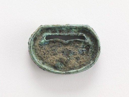 Belt ornament (part of a group of ten: F1916.428-429, 726-730, 740, 743-744)