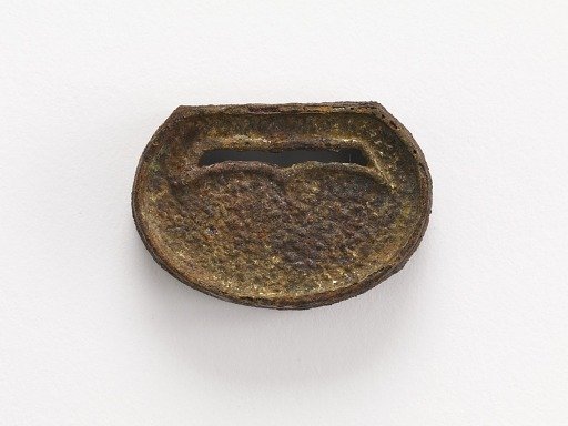 Belt ornament (part of a group of ten: F1916.428-429, 726-730, 740, 743-744)