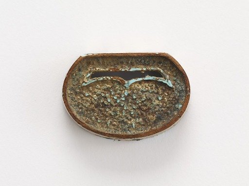 Belt ornament (part of a group of ten: F1916.428-429, 726-730, 740, 743-744)