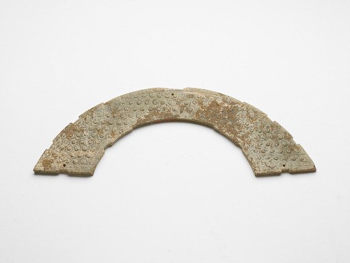 Ornament with raised uniform curls