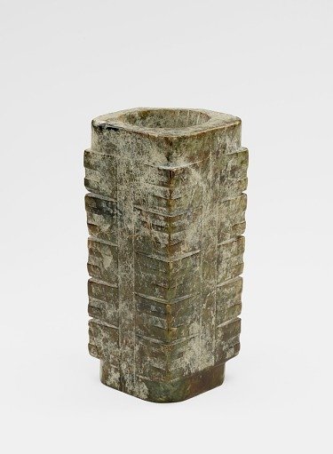 Five-tier tube (<em>cong</em> 琮) with masks