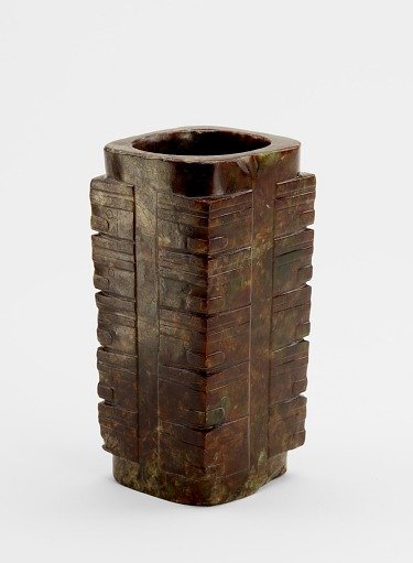 Five-tier tube (<em>cong</em> 琮) with masks