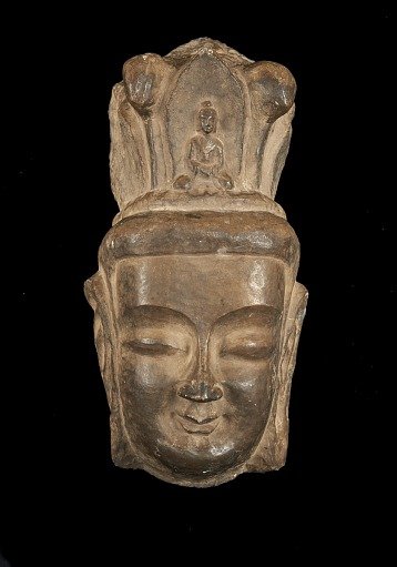 Head of Bodhisattva in high relief, with high headdress containing Amida figure