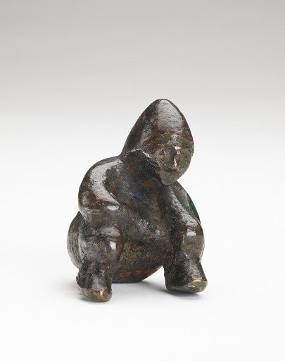 Ornament in the form of a seated person