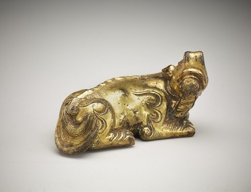 Ornament or weight: a recumbent ch'i-lin