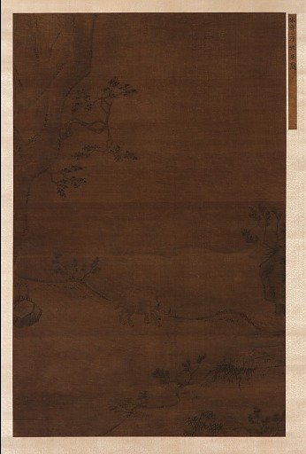 A water-buffalo and a herd-boy near a stream