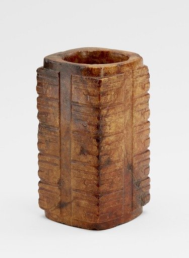 Five-tier tube (<em>cong</em> 琮) with masks