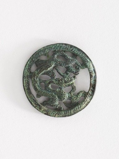 Costume ornament: dragon in roundel (pair with F1917.566)