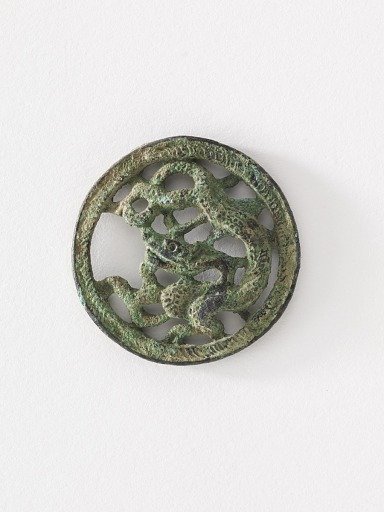 Costume ornament: dragon in roundel (pair with F1917.565)