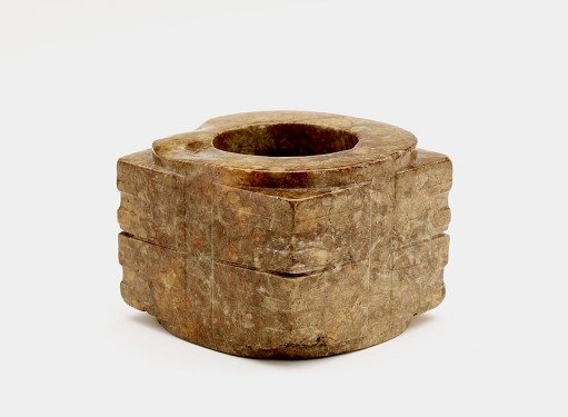 Two-tier tube (<em>cong</em> 琮) with masks