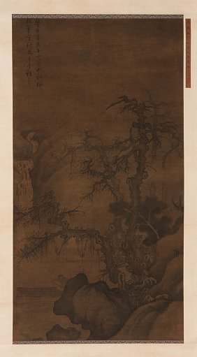 Fisherman boating under winter trees