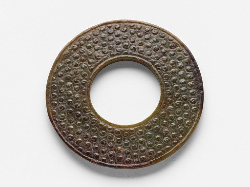 Disk (<em>bi</em>) with raised uniform curls