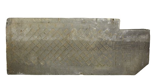 Funerary tile decorated with impressed motifs