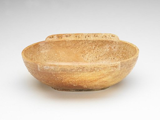 Cup with handles, raised linked curls, and birds