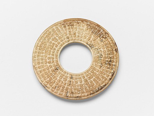 Disk (<em>bi</em>) with raised linked curls