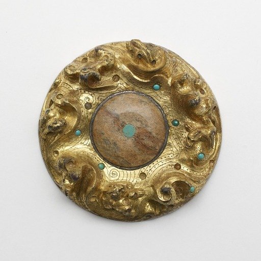 Gilt bronze plaque with animals in a landscape