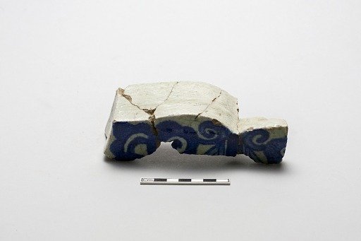 Fragment of an underglaze cobalt-blue-painted wall tile