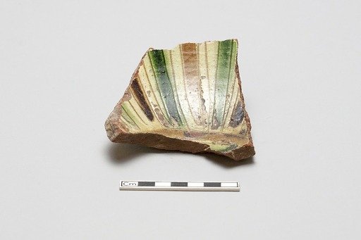 sherd, red body, white slip; green, brown, yellow striped glaze