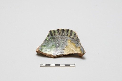 sherd, red body, white slip, yellow, green, black glaze