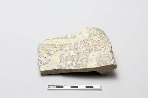 Fragment decorated with a vegetal motif and birds