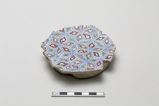 Fragmentary base of a bowl with with abstracted all-over design