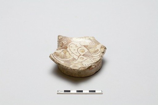 Fragment with design of fantastic animal