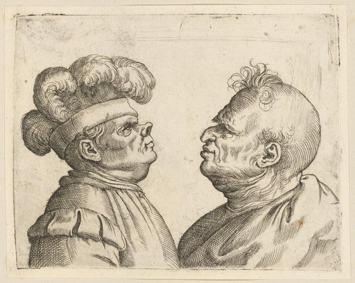 Two grotesque heads