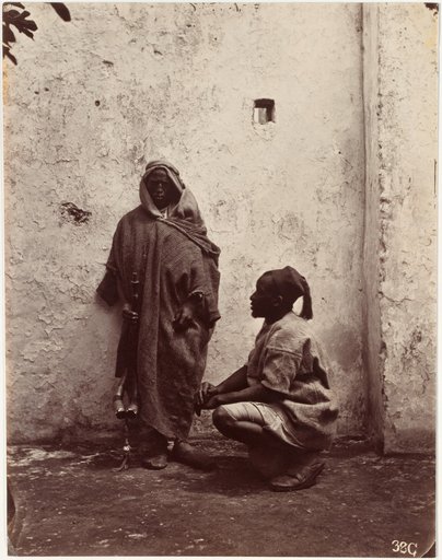 Two Young Men in Front of a House Wall (Tangier)