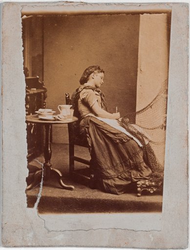 Fisherman's Daughter Mending a Net