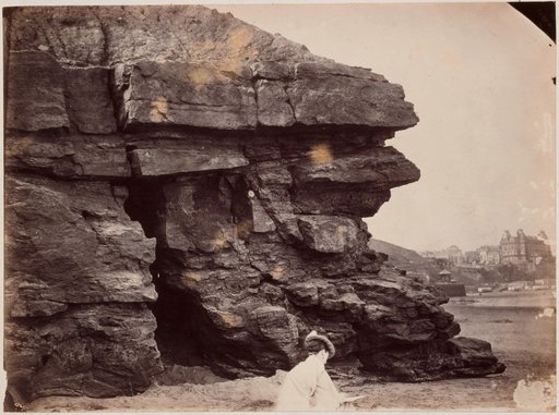Woman Drawing on the Rocky Coast near Scarborough, with the Town and the Grand Hotel in the Background