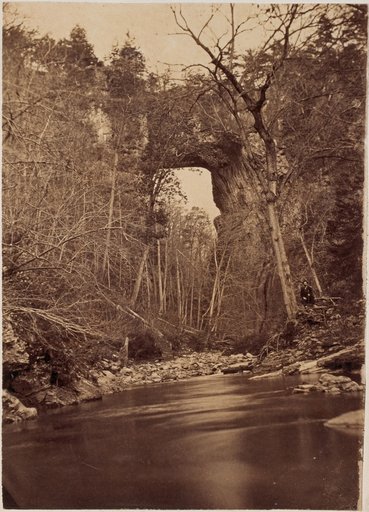 Rock gate ("Natural Bridge") near Lexington, Virginia, with a seated man