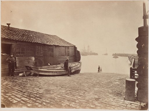 View over a boat ramp to the lighthouse of Scarborough