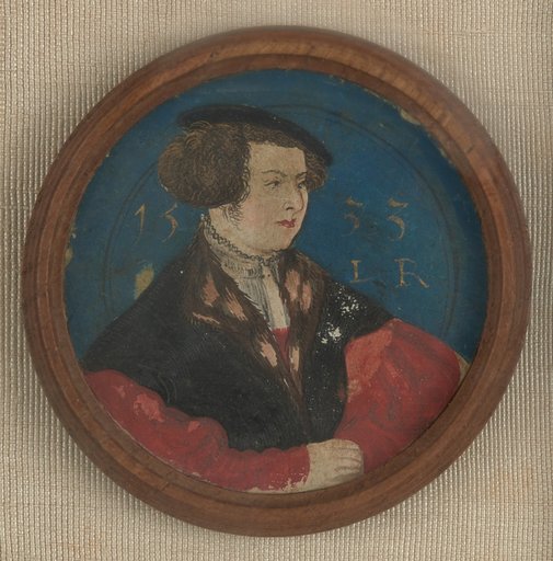 Round medallion with a half-length portrait of a young man wearing a black cap, facing right