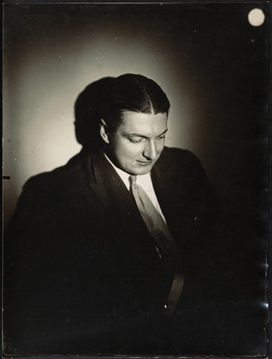 Man with downcast eyes