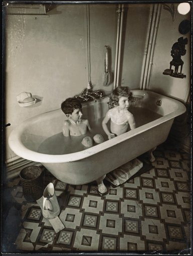 Children in a steel bathtub