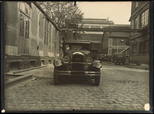 Citroën "SIX" Automobile in Front of Commercial Buildings
