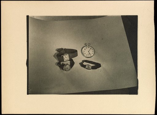 Three wristwatches and one pocket watch