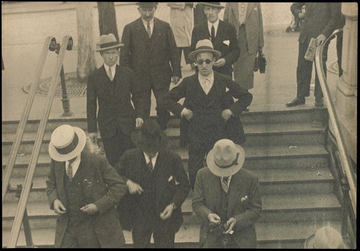 Pedestrians on the stairs to the Métro
