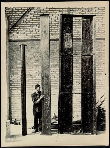 Workers with metal parts, Fillod factory in Florange (Moselle)