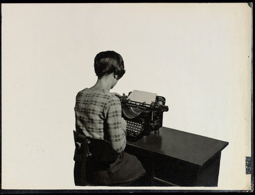 Woman at an AEG typewriter, maquette for use of the photograph