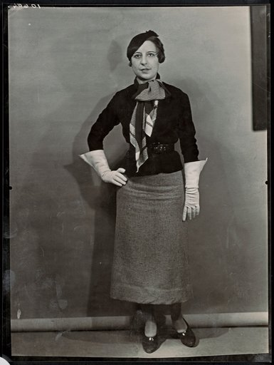 Mme Bernoud Posing with Scarf and White Gloves, Advertisement for "Le Bon Marché"