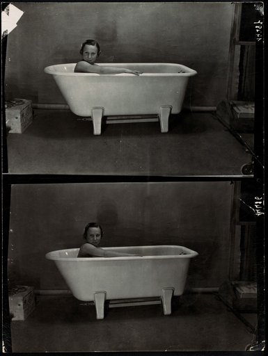 Woman in a bathtub, advertisement for "Crystal"