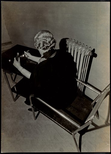 Rear View of a Seated Woman with a Bottle and Spoon, Advertisement for the "Compagnie de chemins de fer de Paris à Orléans"