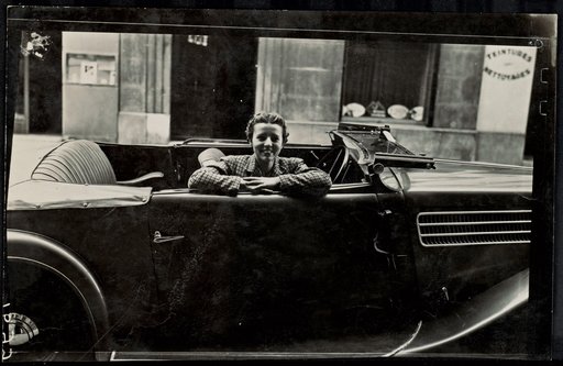 Woman in Passenger Seat of Convertible, Advertisement for Engine Oil "Essolube"