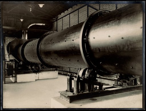 Factory hall with large pipe on concrete supports