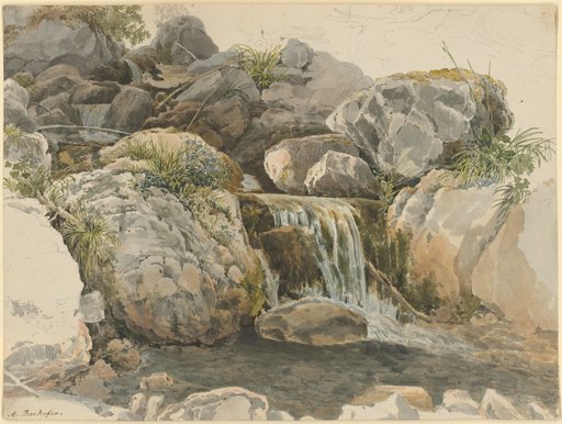Waterfall of a Mountain Stream between Mossy Boulders