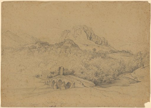 Cassano in Calabria, ancient Sybaris. Rocky mountain massif wooded at its base with a castle complex above the tree line. In the foreground a vaulted stone bridge over a river
